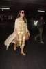 Actress Neha Dhupia spotted in Indigene at the Airport